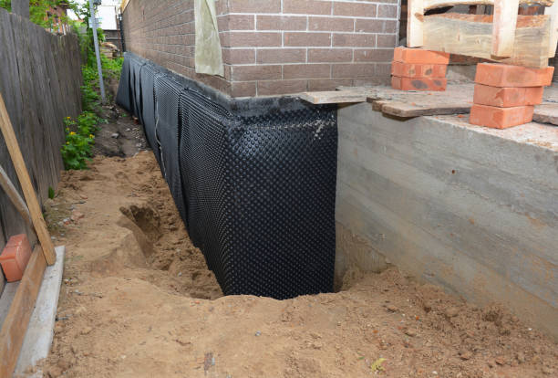 Happy homeowners after waterproofing job in Gibson Island